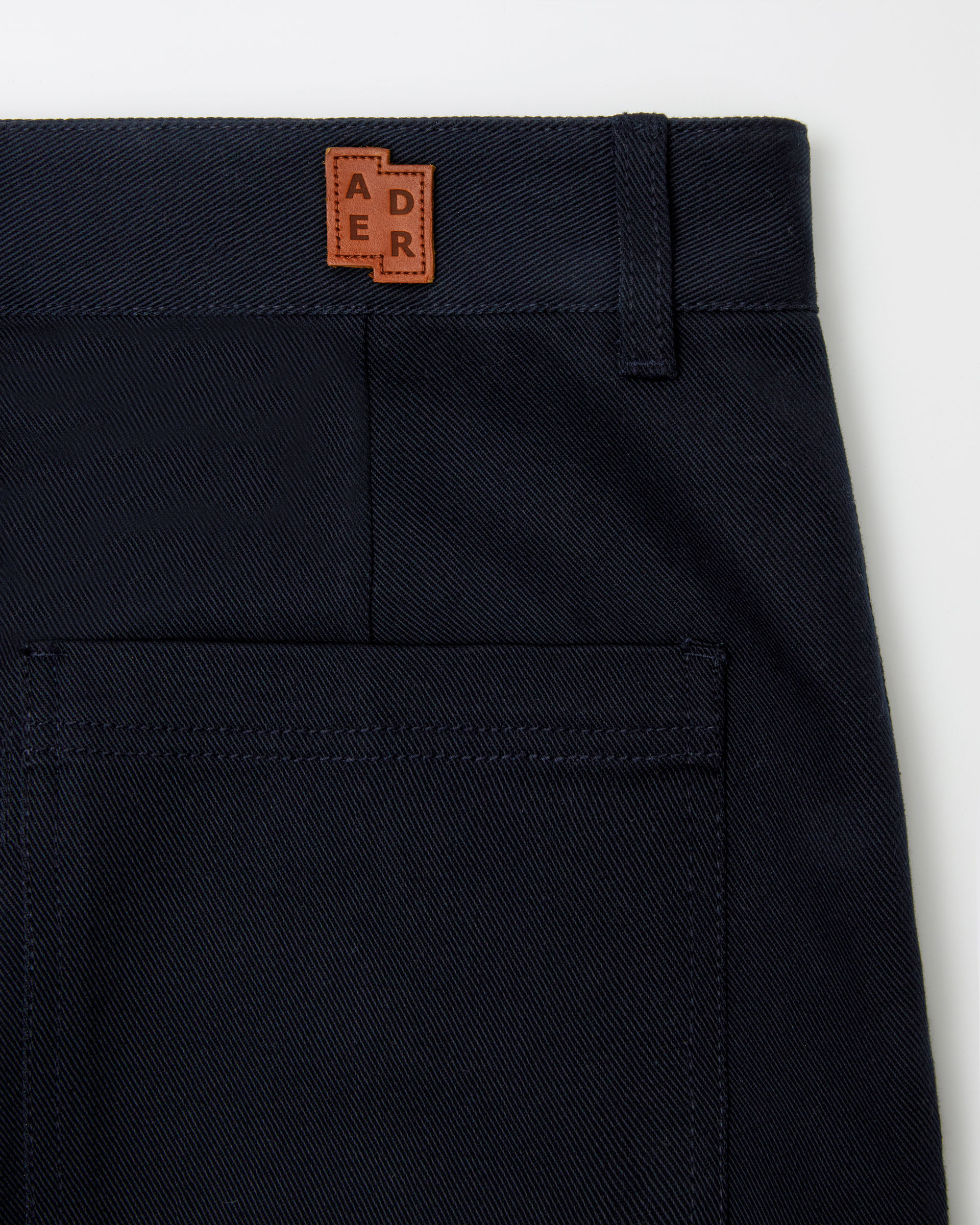 ADERERROR - Sig; BL Tag trousers 01