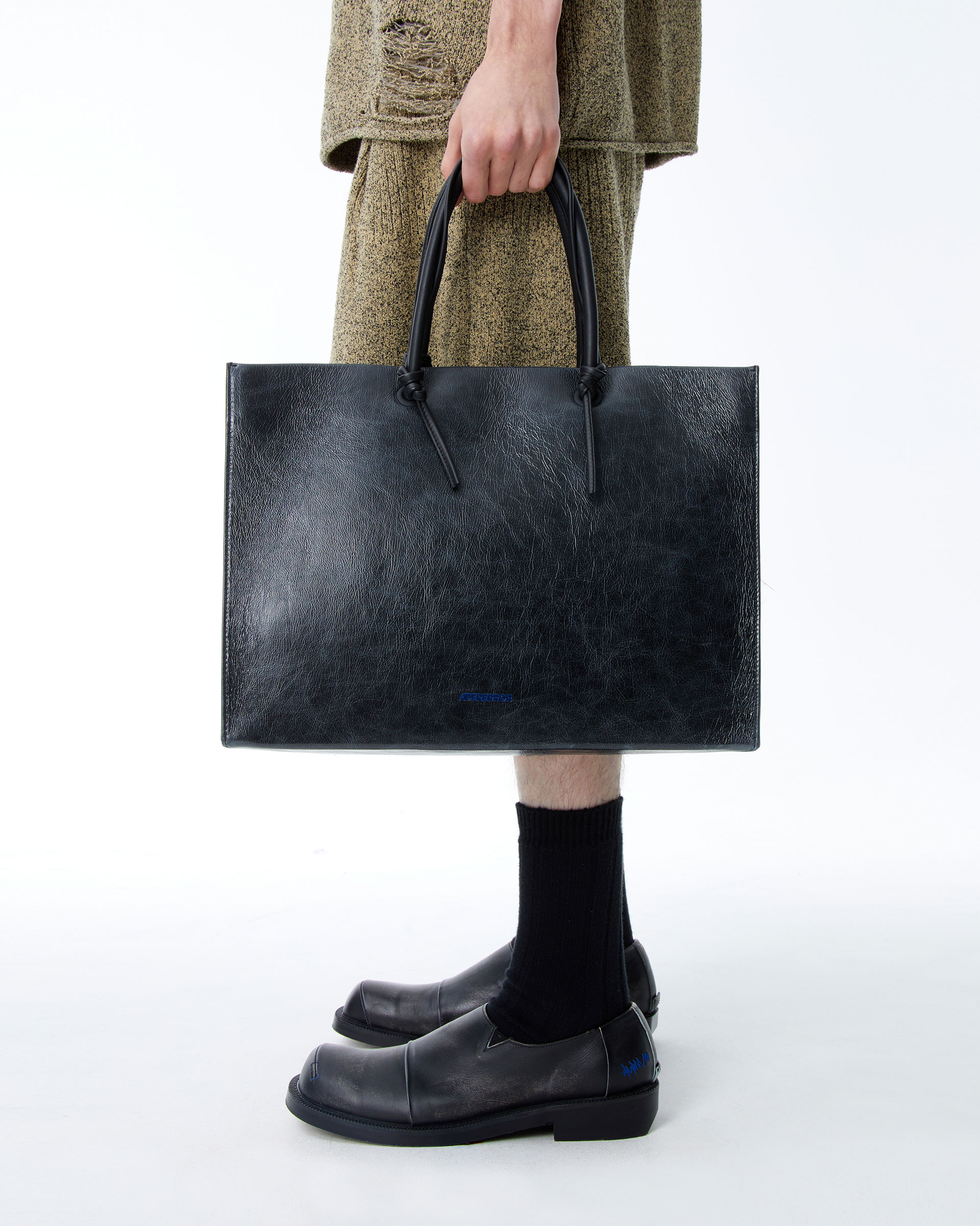 ADERERROR - Wide cracked shopper bag