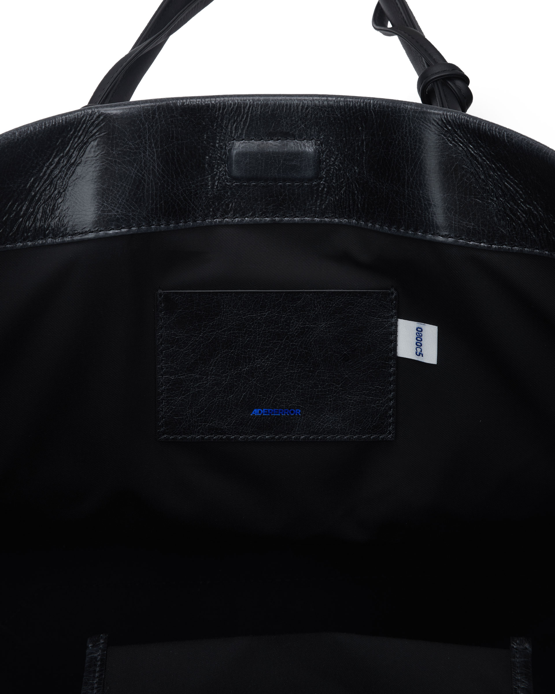 ADERERROR - Wide cracked shopper bag