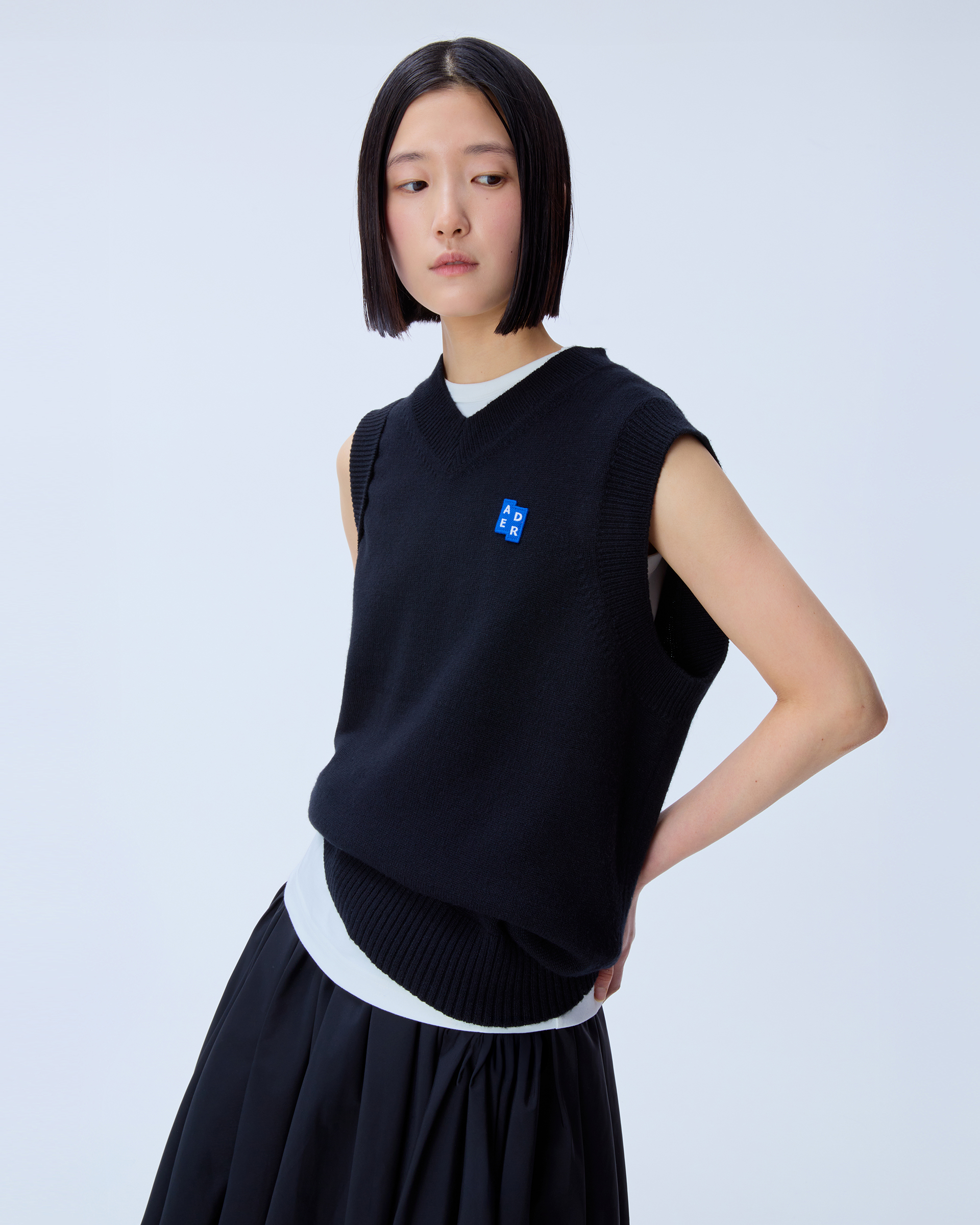 ADERERROR - Sig; BL Tag knit vest 01